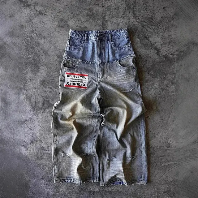 Jean double superposé délavé