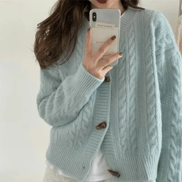 Cardigan torsadé boutons corne