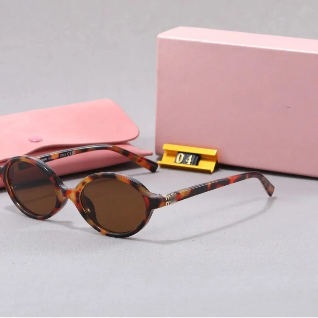 Lunettes ovales Miu Miu