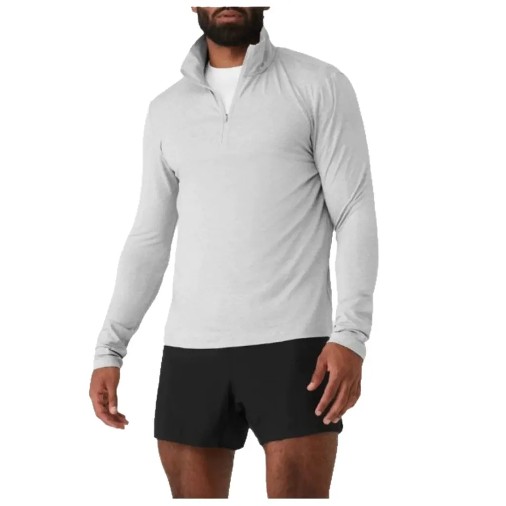 Haut sport demi-zip