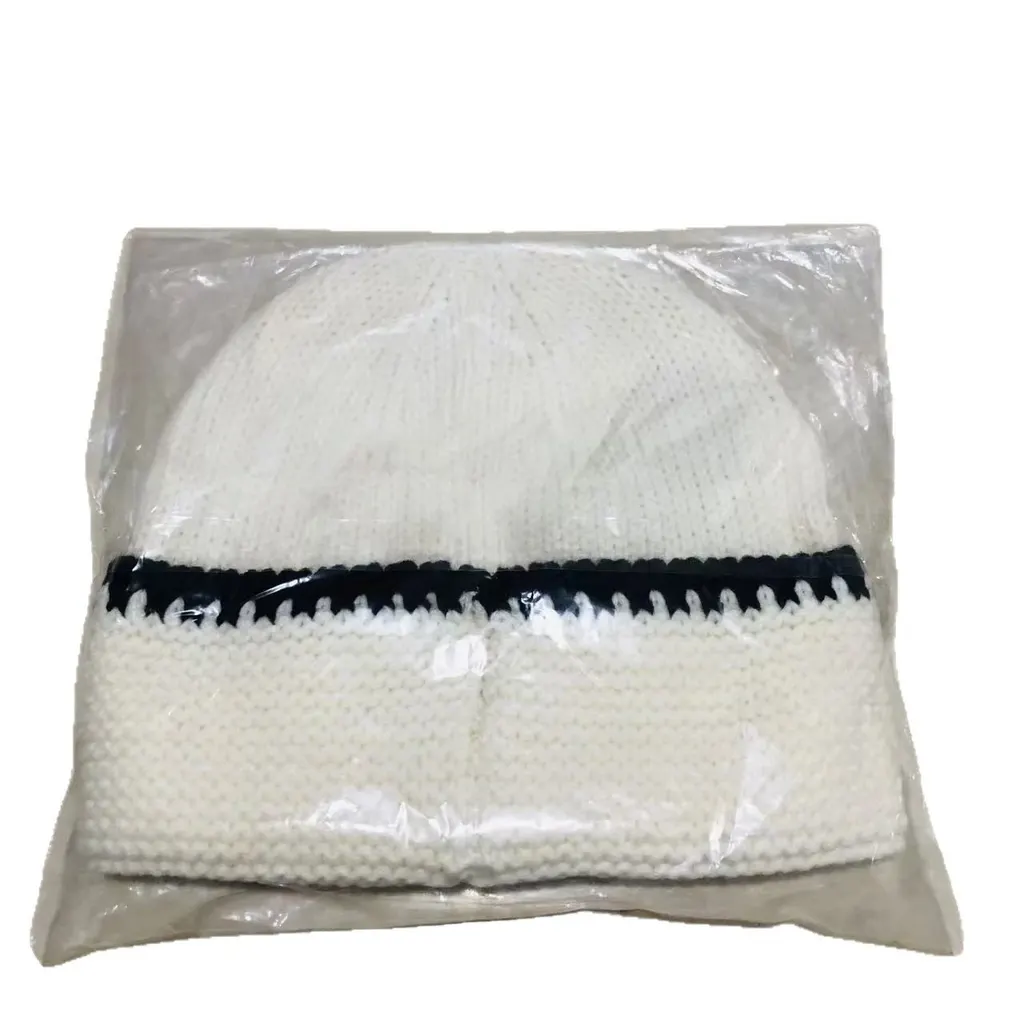 Bonnet Chanel en maille