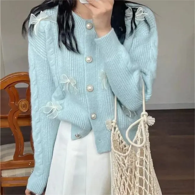 Cardigan maille nœuds perles