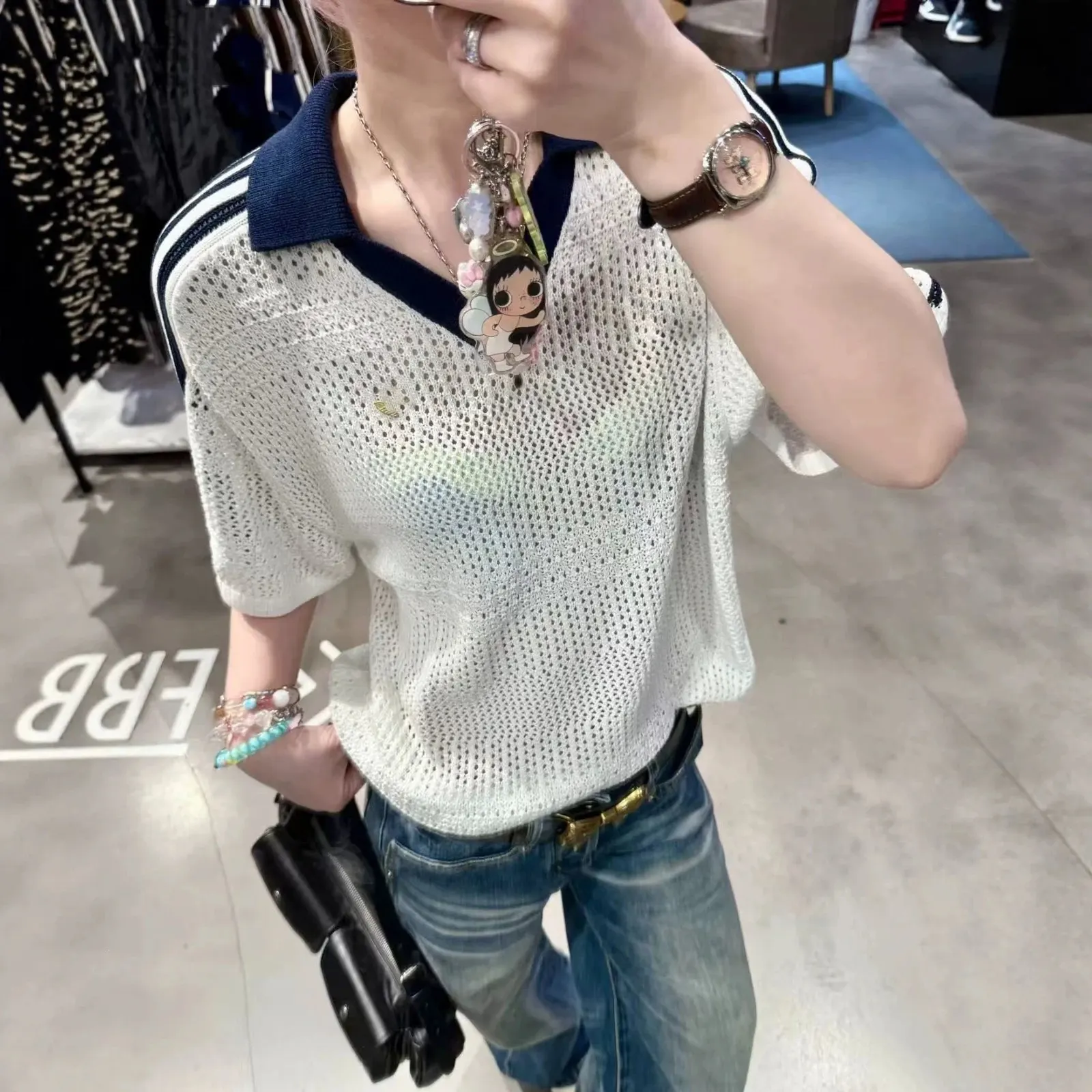 Polo en maille ajourée