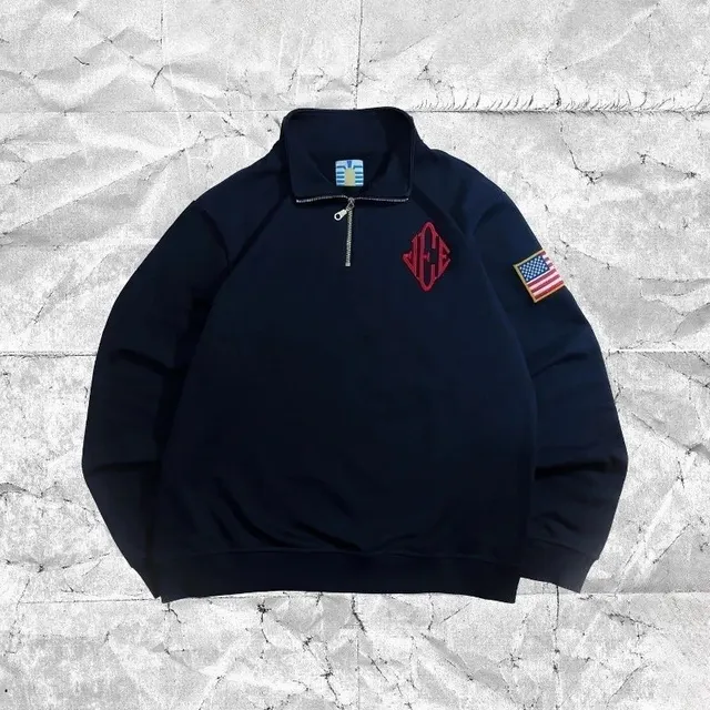 Sweat col zippé brodé