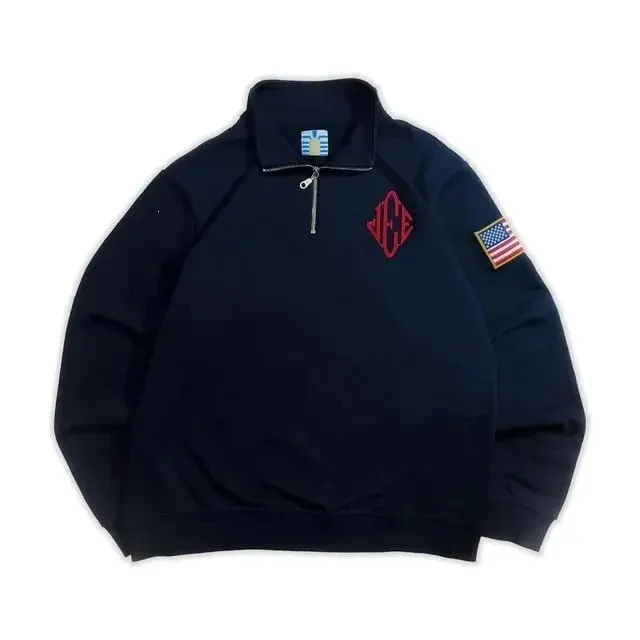 Sweat col zippé brodé