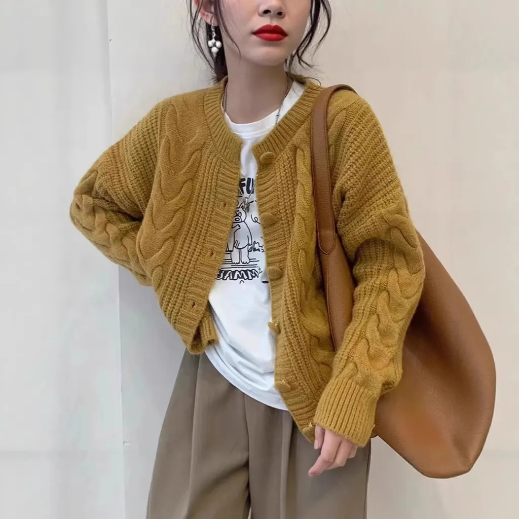 Cardigan en maille torsadée