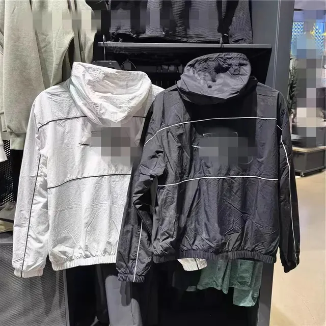 Veste coupe-vent à capuche