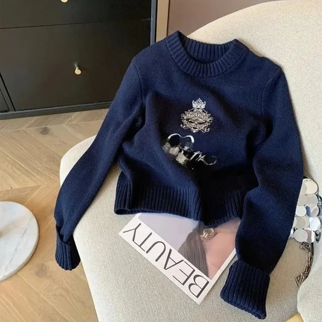 Pull brodé blason couronne