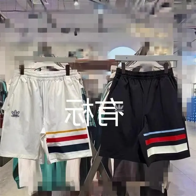 Short Adidas rayé