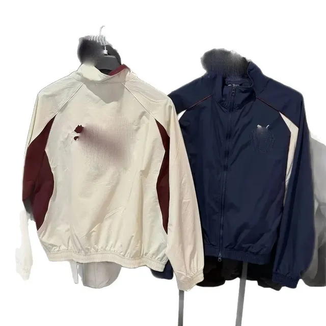 Veste coupe-vent zippée
