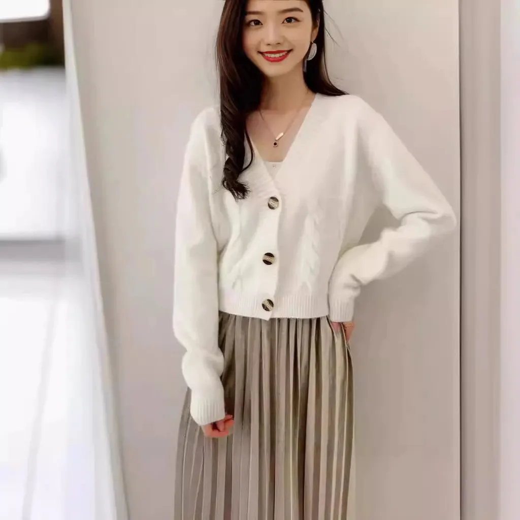 Cardigan court en maille torsadée