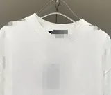 T-shirt brodé à carreaux