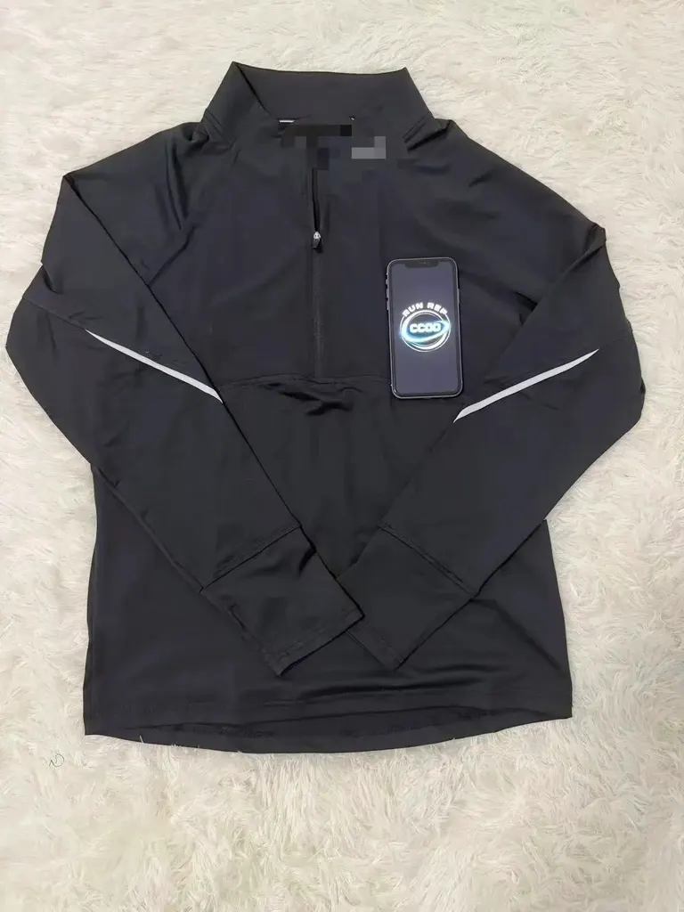 Veste running demi-zip